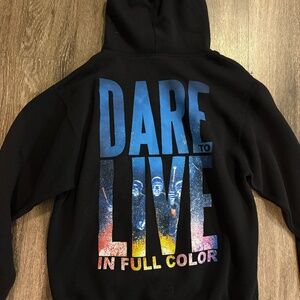Blue Man Group Black Hoodie with Dare to Live Graphic
